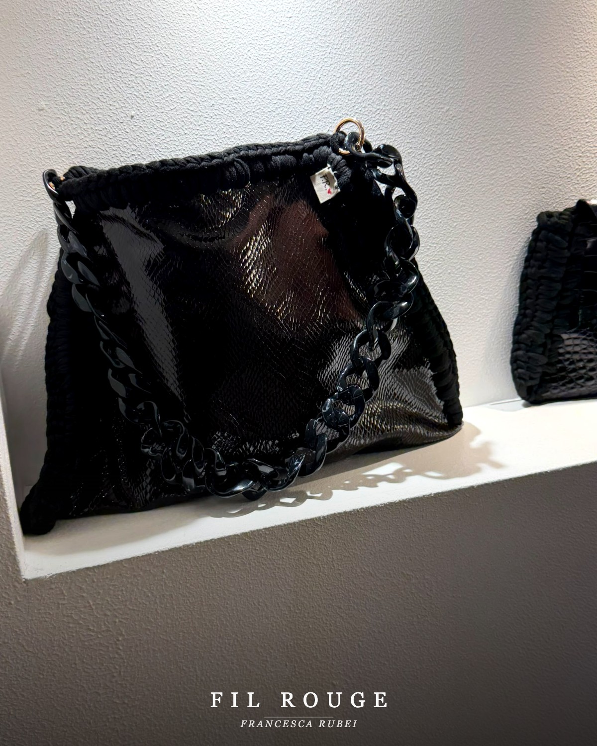 Snakeskin-print bag with chain strap
