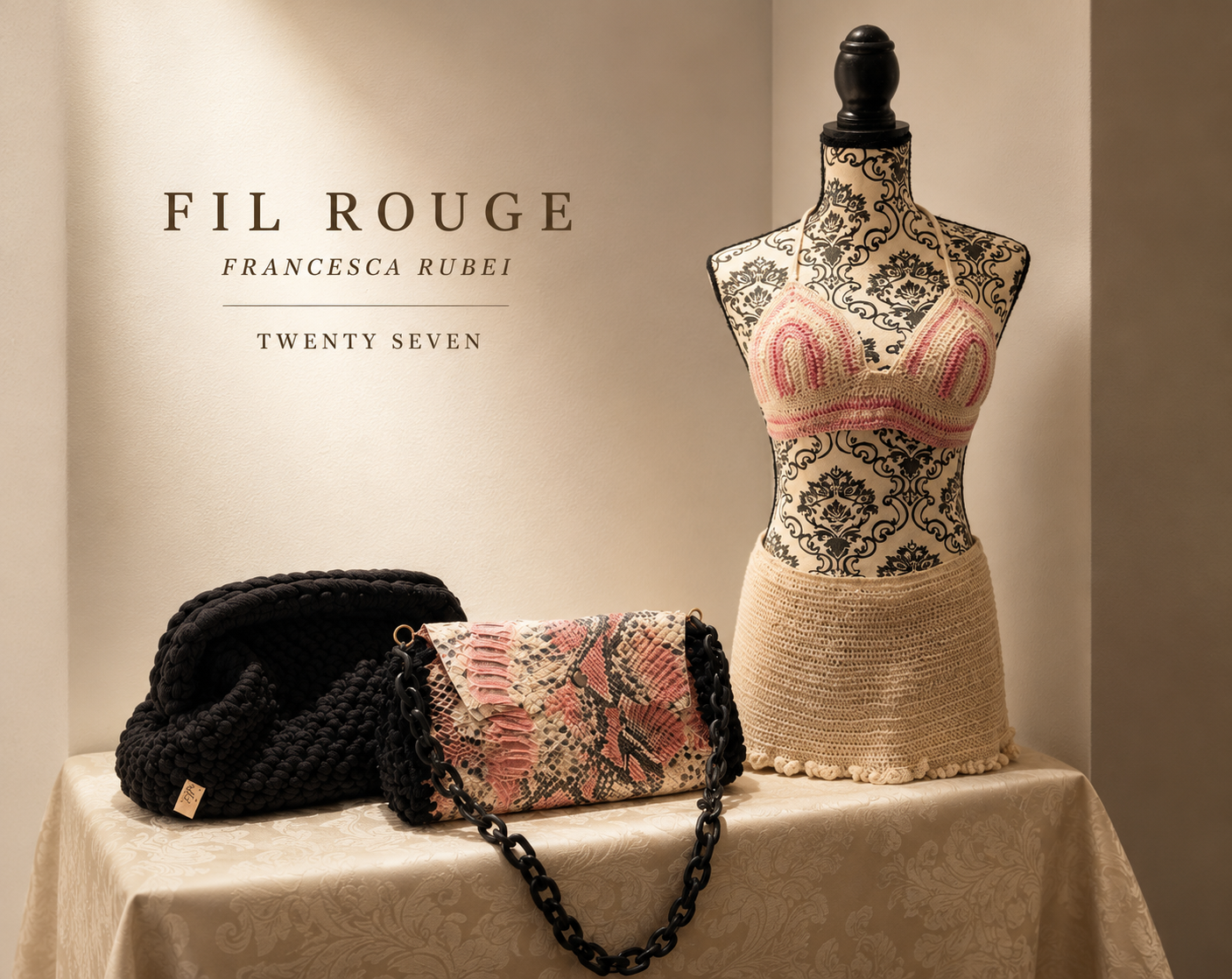 Noir and python-print crochet clutches beside a cream bralette on a mannequin